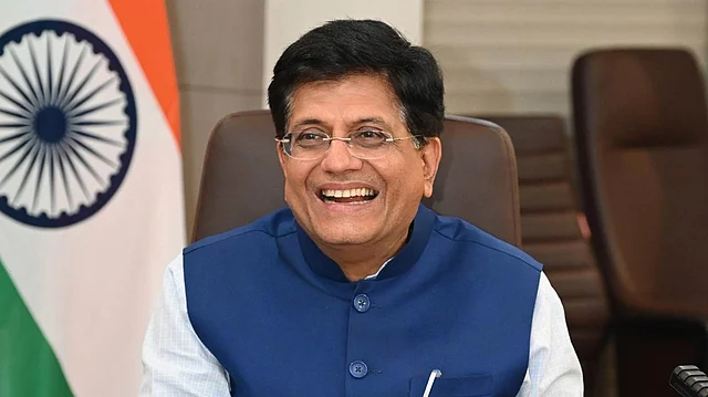 Indian Minister Piyush Goyal smiles during a virtual India–UK FTA announcement.