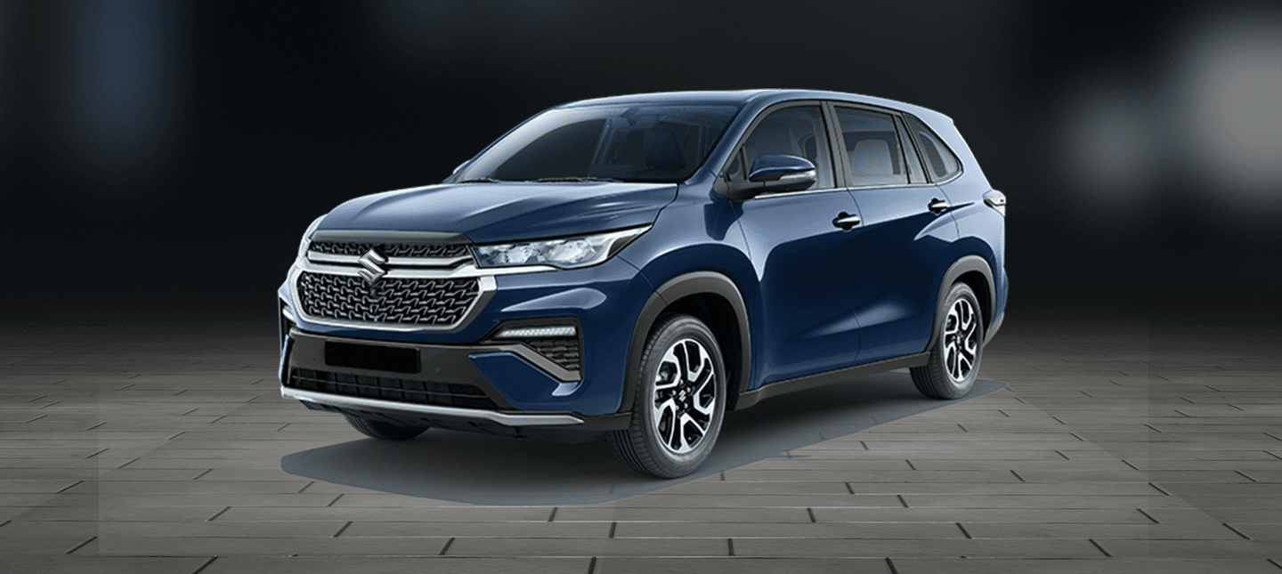 Maruti Suzuki Invicto 2025 front three‑quarter view with bold grille and LED headlamps