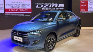 Front-side view of the 2025 Maruti Suzuki Dzire with refreshed styling, LED lights, and alloy wheels