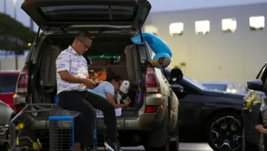 “People sitting at the back of a car during evacuation after Russia earthquake-triggered tsunami alerts in Hawaii.”