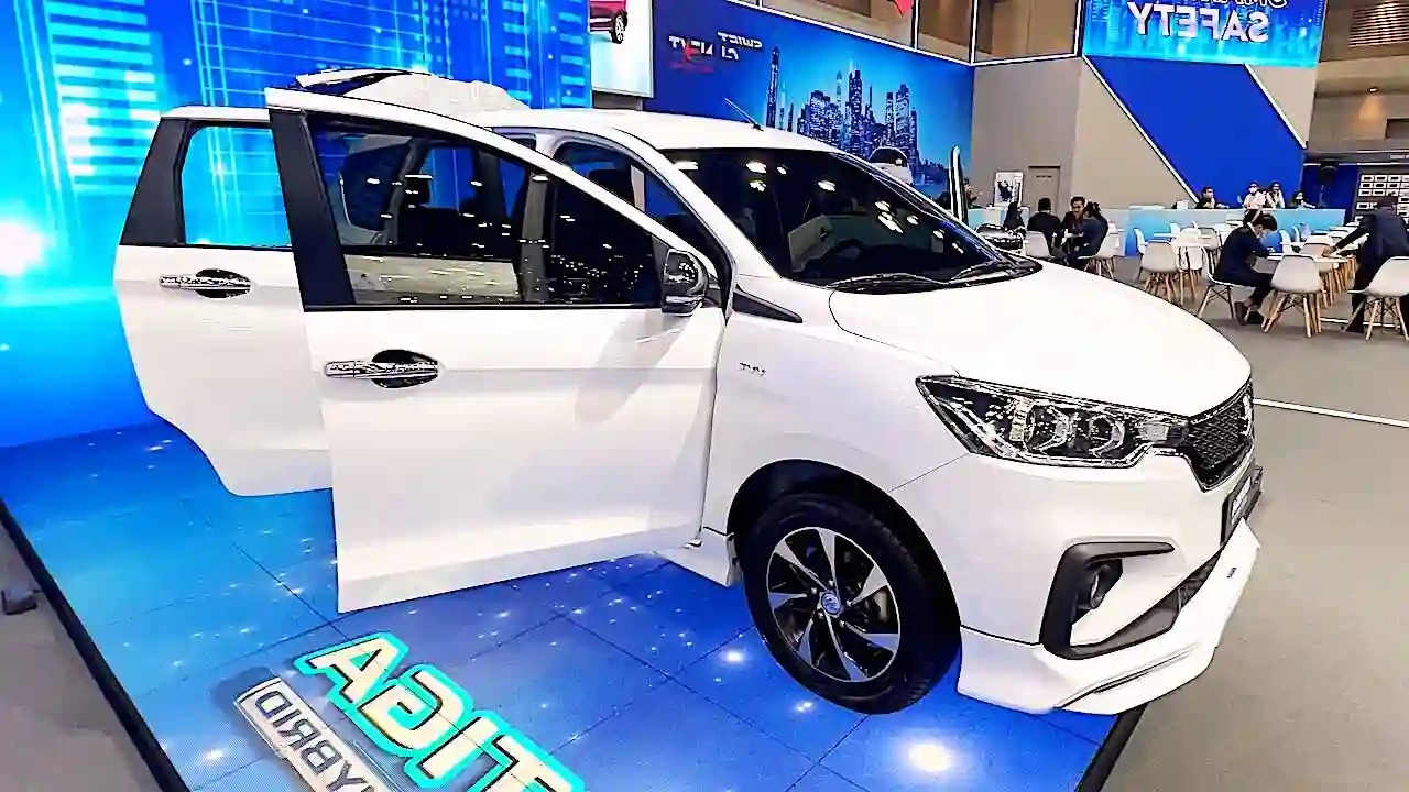 “Maruti Ertiga 2025 front side view in white color.”