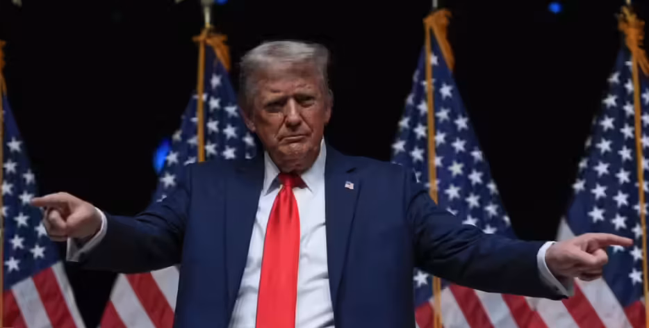 Donald Trump addresses media while announcing 25% tariffs on India with additional penalties.
