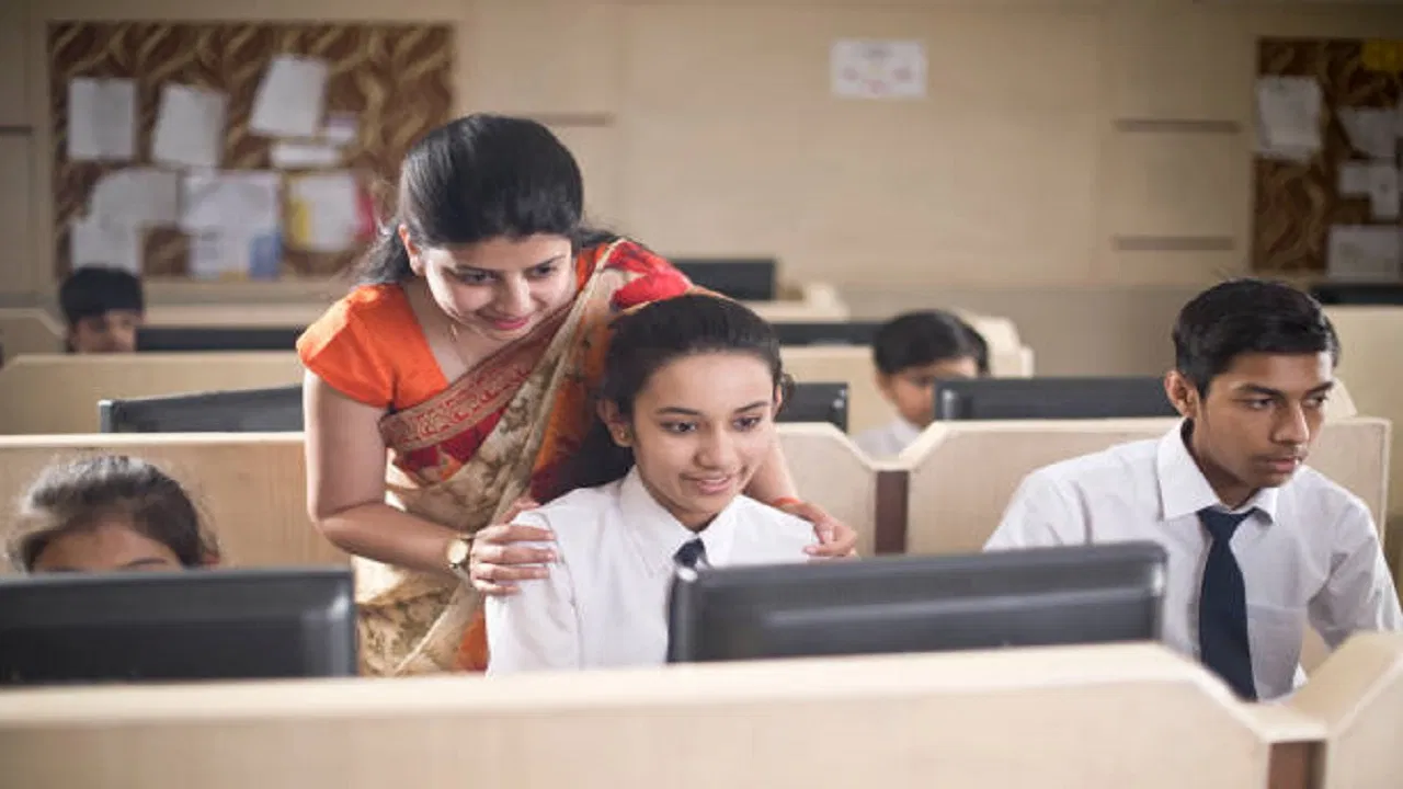 Students learning digital skills to apply for CBSE scholarship programs online